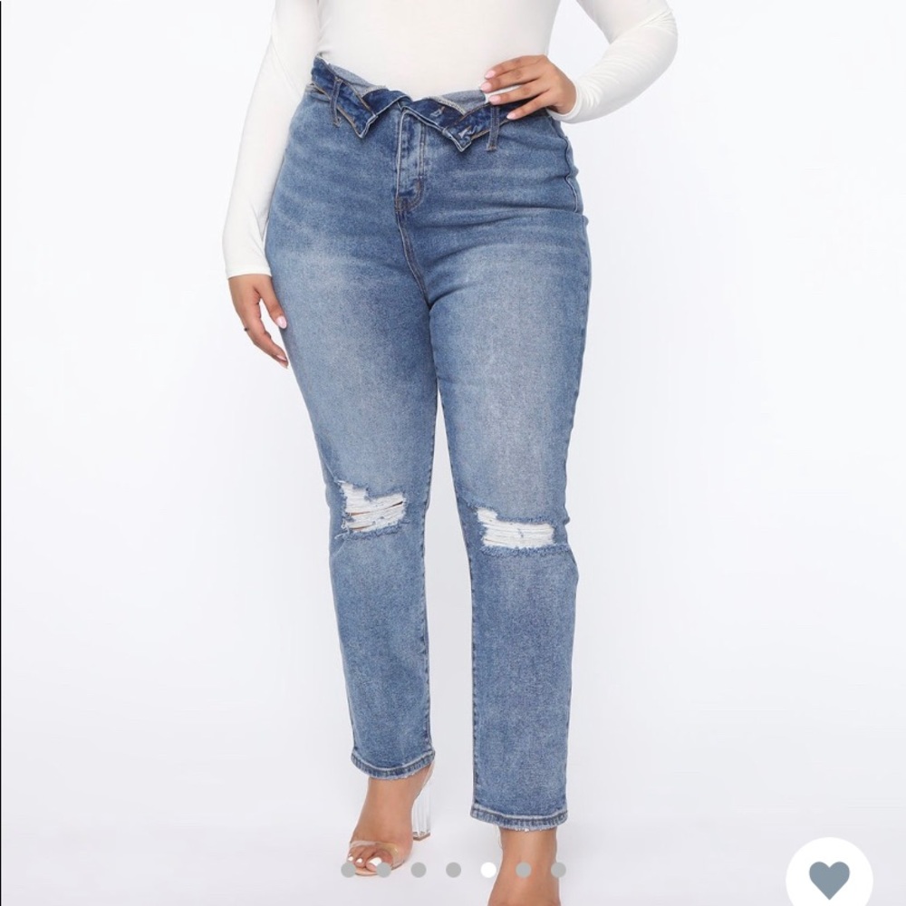 Distressed high rise straight jeans.